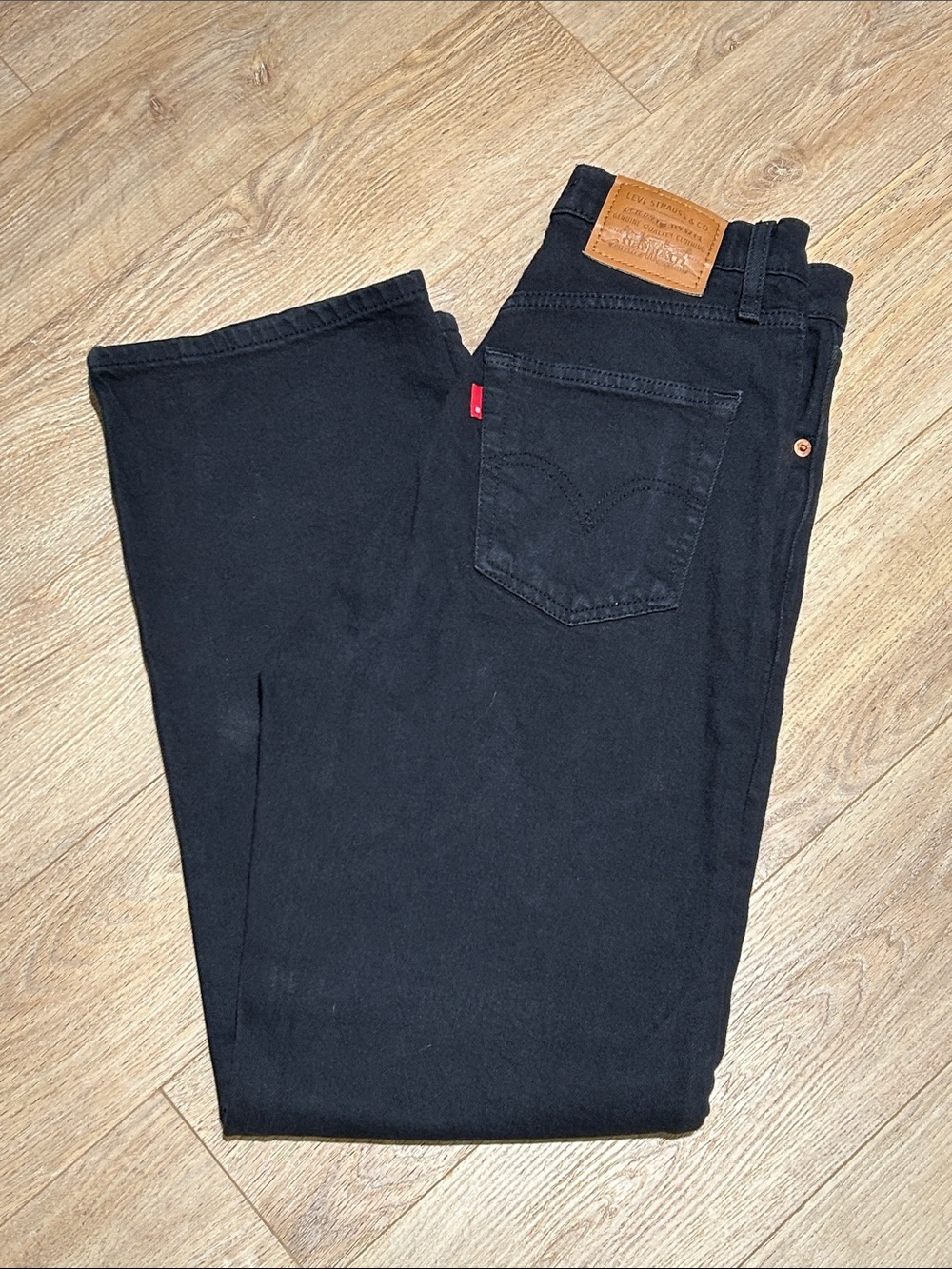 Levi's Ribcage Straight Ankle Jeans. Jet Black Crop with Blank Red Tab